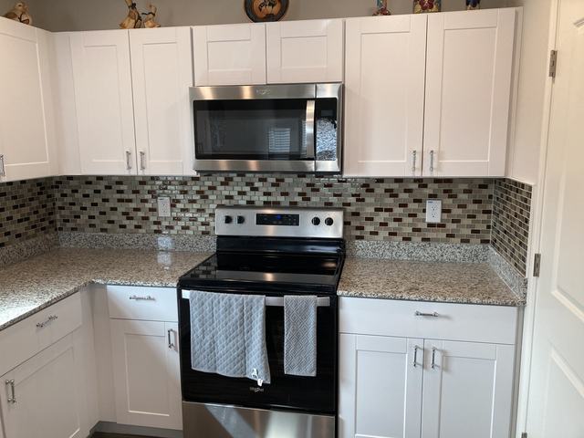 Mosaic tile kitchen backsplash