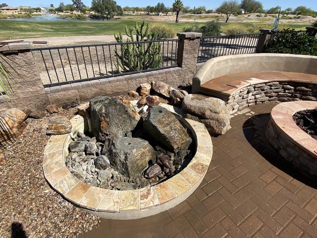 Fire pit with natural boulders